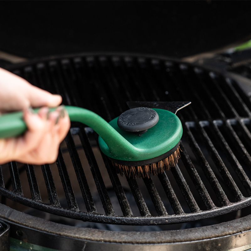 Long Handle Grid Scrubber used to clean a Cast Iron Grid of the Big Green Egg